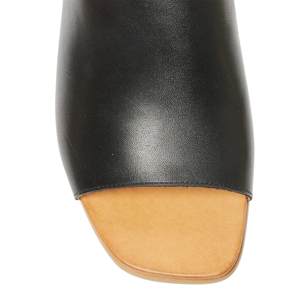 Carmen Heel in Black Leather