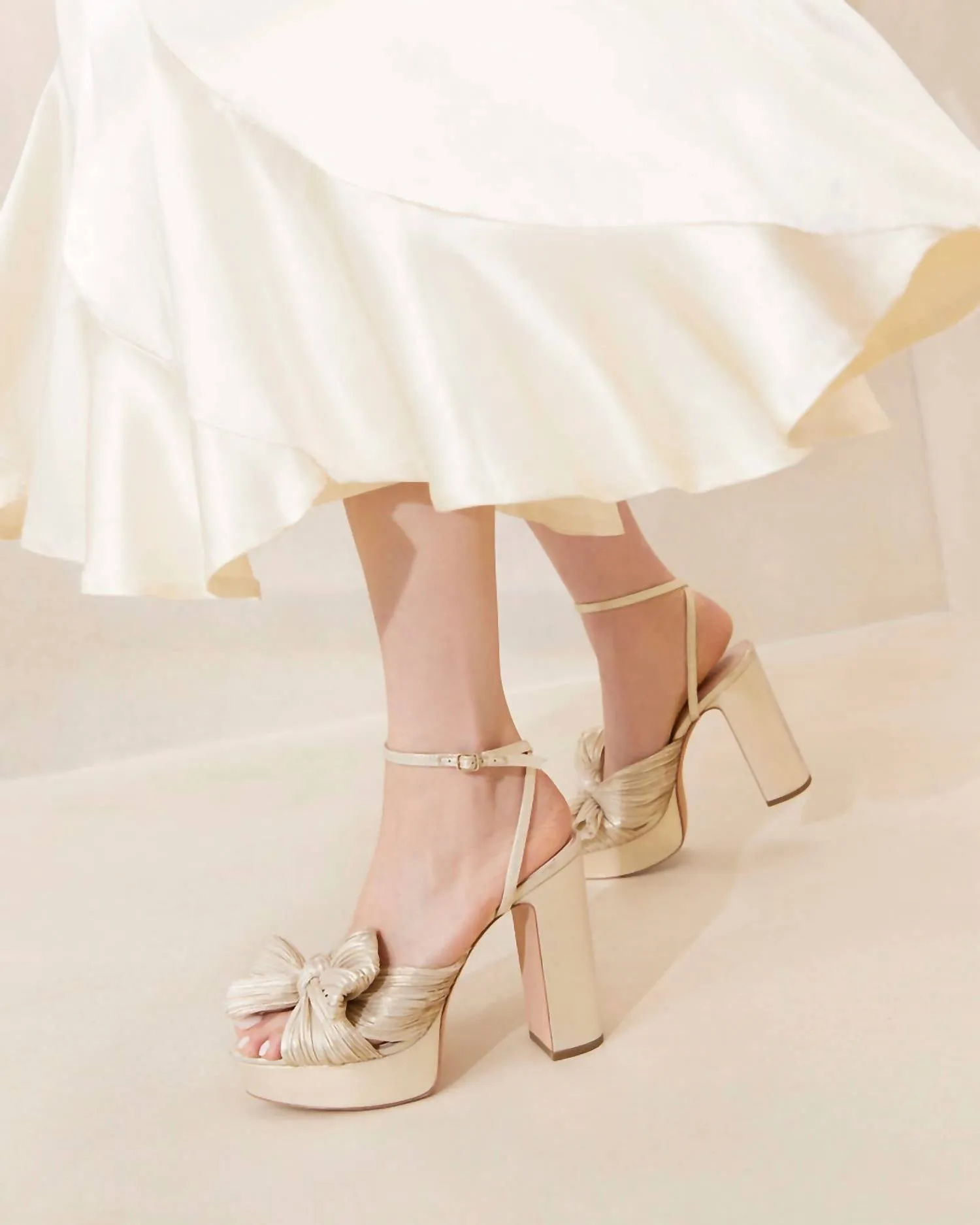 Natalia Platform Bow Heel In Platinum